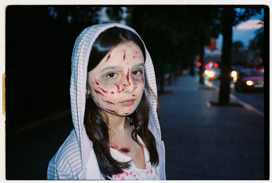 Young girl spooky zombie Halloween makeup. Film