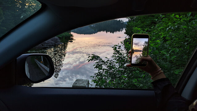 Capturing the sunset from a car window