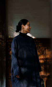 Woman in Light and Shadow with Garden Shadows.