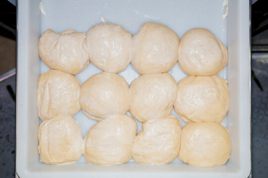 Freshly Made Dough Balls in a Tray for Baking