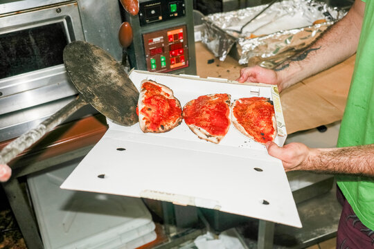 Traditional calzone with baked tomato sauce 