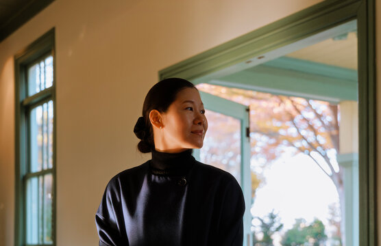 Close-up of a Woman's Side Profile in Warm Sunlight.