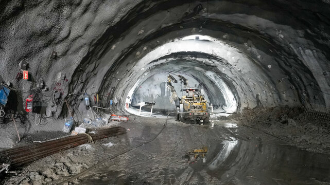 Tunnel construction site with excavation machinery
