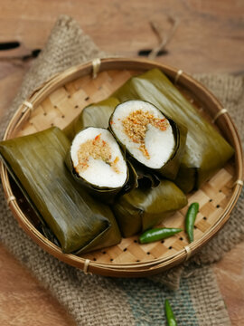 Lontong oncom, Indonesian traditional food made from compacted rice with oncom filling made from fermented soybeans. Wrapped with banana leaves. famous food or starter for ifthar or takjil in ramadhan