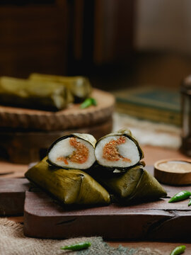 Lontong oncom, Indonesian traditional food made from compacted rice with oncom filling made from fermented soybeans. Wrapped with banana leaves. famous food or starter for ifthar or takjil in ramadhan