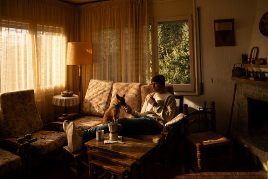 Man resting with dog