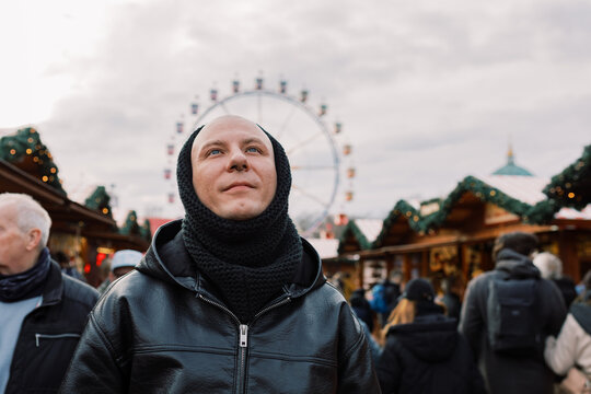 Man Enjoying the Festive Atmosphere on Xmas Market