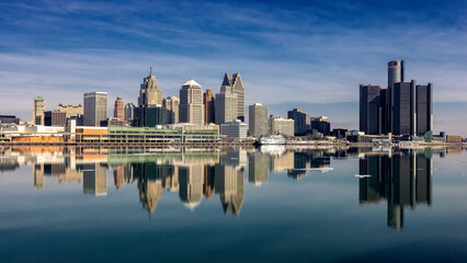 Reflective Afternoon View of Detroit Michigan with the city skyline reflecting