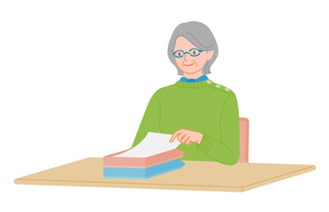 Senior woman placing document on tray at desk
