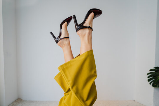 Anonymous woman displays high heels