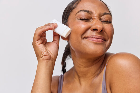 Beautiful woman in studio wearing a bodysuit