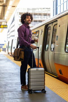 Man confident wait for subway train 