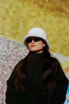 Woman in Sunglasses and White Hat Outdoors