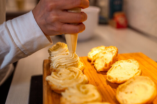 Filling Cream Puff Shells