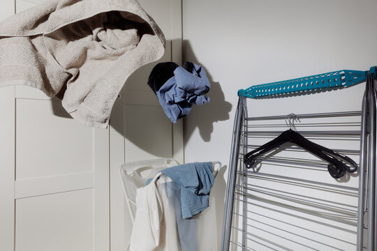 A laundry basket where clothes are thrown