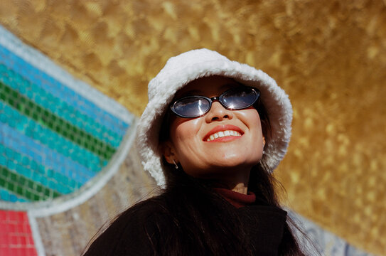 Woman in Sunglasses and White Hat Outdoors