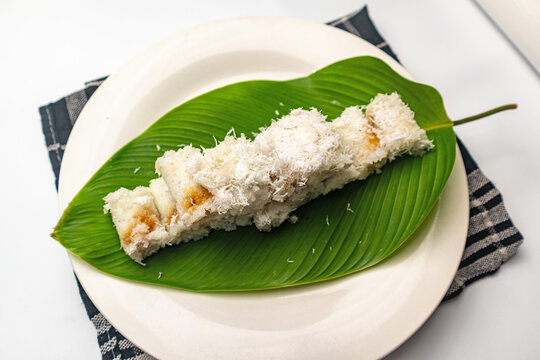 Kue putu is a type of traditional Indonesian snack in the form of a cake filled with Javanese sugar, coated with grated coconut and rice flour