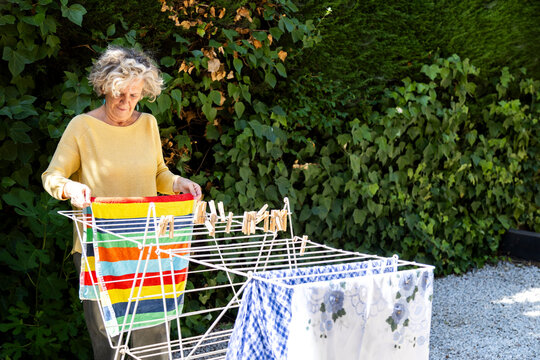 Hanging laundry on drying rack