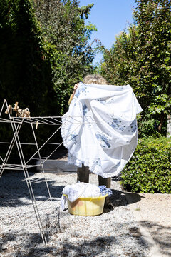 Hanging Laundry in Garden
