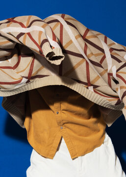 Model Wrapped in Layered Wool Cardigan