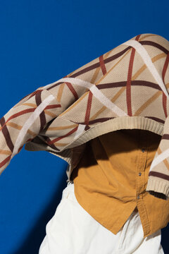 Model Wrapped in Layered Wool Cardigan