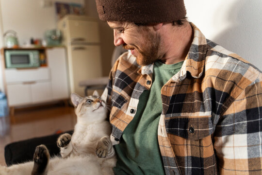 Man cat home