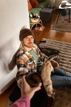 Man cat home 