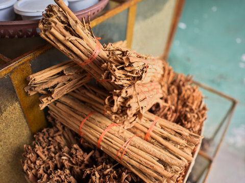 Bunches of cinnamon sticks for sale in Sri Lankan spice shop