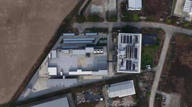 Aerial drone video of a large scale data center in Thailand, highlighting big data processing, machine learning infrastructure, colocation services, and cloud computing facilities supporting digital t