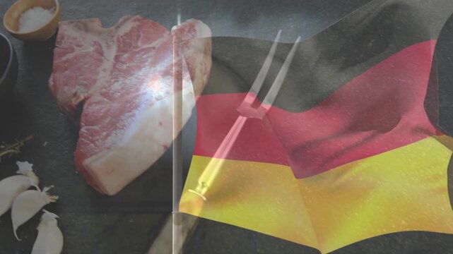 German tricolor flag rippling revealing steak and utensils as lens flare brightens to showcase food