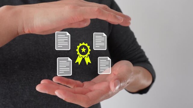 Close-up of a woman's hands shielding an animation of several documents with a certificate emblem.