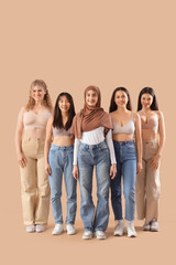 Fototapeta premium Group of young women on beige background