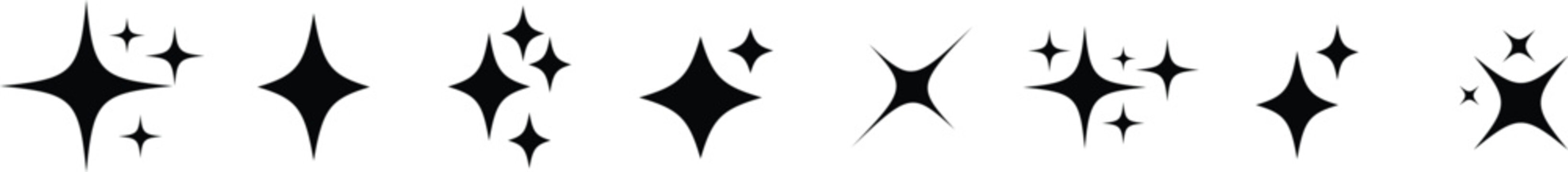 A horizontal array of various black four pointed sparkle shapes and shining star icons on white