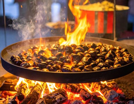 Traditional roasted chestnuts over an open fire at a street market