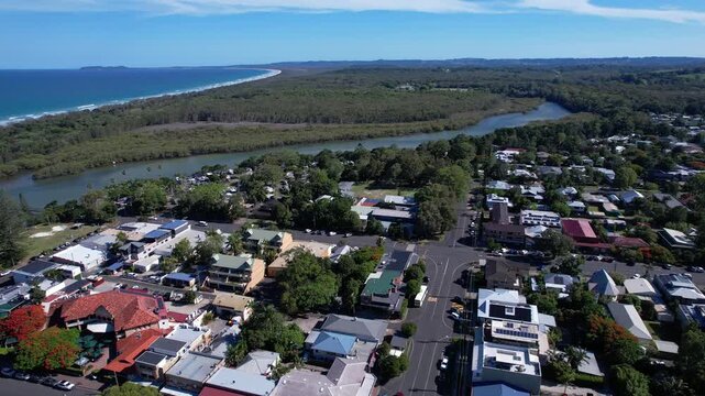 Simpsons Creek In The Coastal Town Of Brunswick Heads In Australia. aerial pullback shot