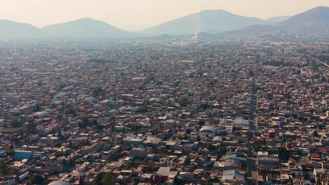Drone sunset scene of Ecatepec urban density, Mexico