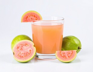 Fototapeta premium Glass of fresh pink guava juice with whole and sliced guavas on white background