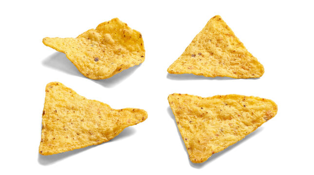 top view photograph of four crunchy corn tortilla chips arranged in a square formation against a plain transparent background, highlighting their texture and shape.