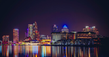 Panoramic Tampa Downtown Skyline at Night with Colorful Reflections © Andrei Liashchou