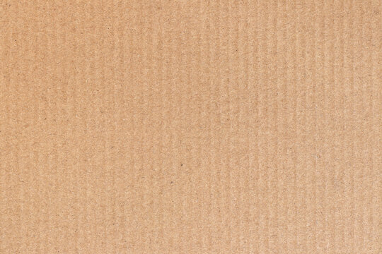 Brown cardboard sheet abstract background, texture of recycle paper box in old vintage pattern for design art work.