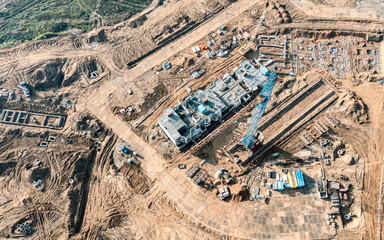development of city residential area. new concrete apartment buildings under construction. aerial overhead view.