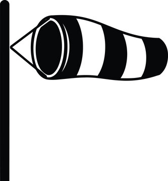 Black and white windsock on pole indicating wind direction