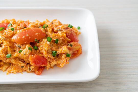 Stir-fried tomatoes with egg or Scrambled eggs with tomatoes