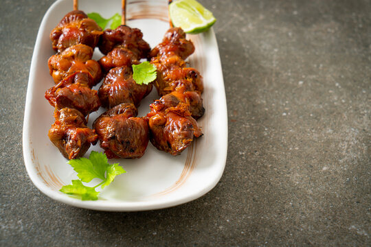 grilled chicken gizzard skewer with herbs and spices
