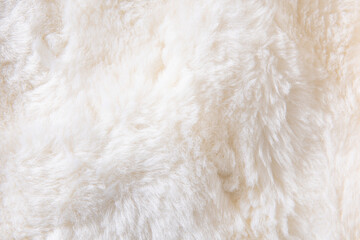 white plush fabric texture background , background pattern of soft warm material © zhikun sun