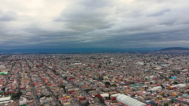 Aerial perspective of Ecatepec metropolitan area under overcast skies