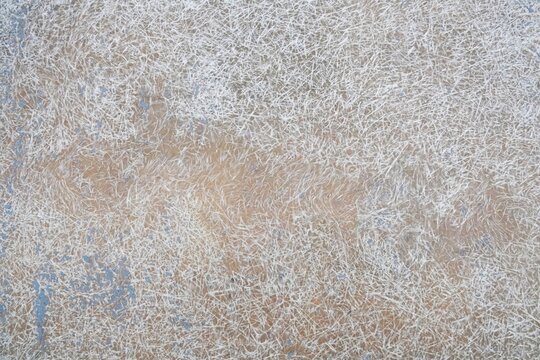 Fiberglass texture background on the surface of the boat. Fiberglass reinforced plastic surface texture. Detail of the fused threads of a fiberglass material.