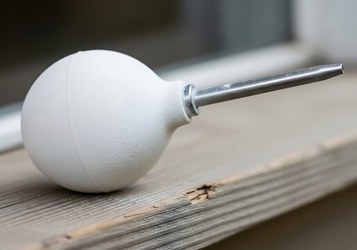 Enema Ball on a Wooden Surface