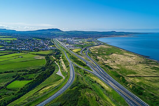 An aerial view of the M2 Motorway near Ballymena, showcasing the perfect backdrop for tourism, transport, and real estate marketing that draws interest to the area.