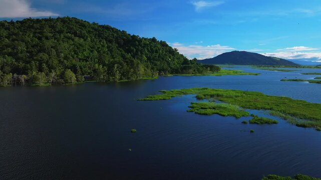 Sepik River Basin Province Aibom Village Chambri Lakes Papua New Guinea PNG aerial drone Papua Niugini Wasara Gawi LLG district Sandaun Region sunny blue sky morning nature landscape circle left moti